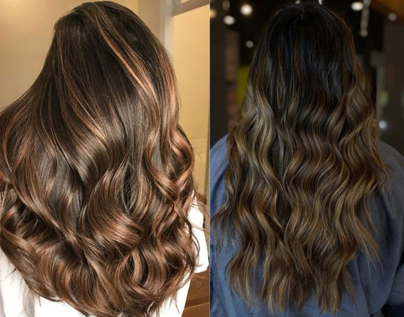 Black hair with soft caramel highlights on natural waves, close-up portrait, warm lighting