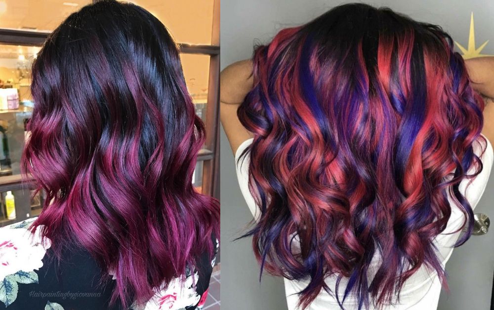 Black hair with vibrant red and blue ombré, edgy street style, dramatic lighting.