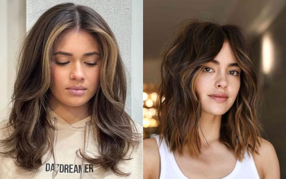 Black hair with warm brown face-framing highlights, soft waves or curtain bangs