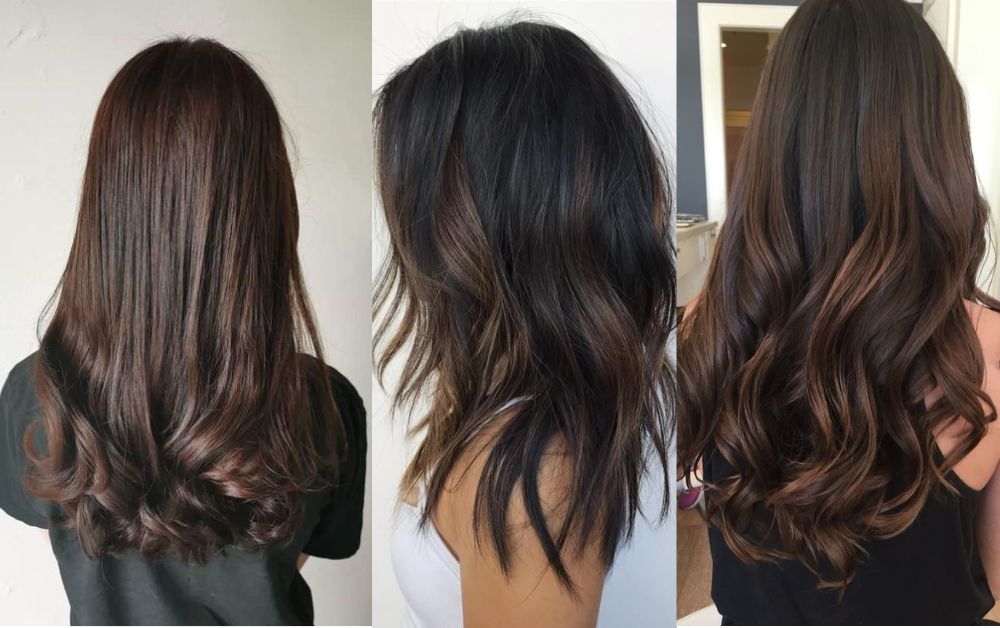 Close-up of black hair with fine, subtle brown highlights reflecting natural shine