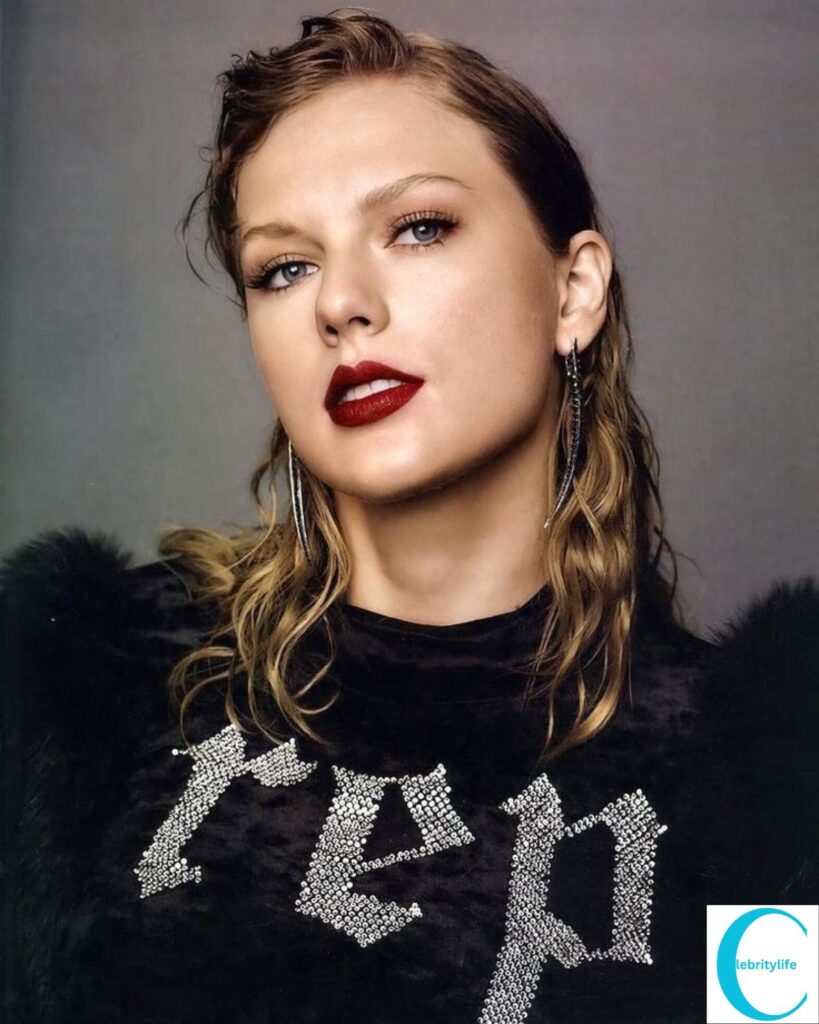 Taylor with slicked-back hair, smoky eye makeup, darker tones—award show or Reputation album shoot.