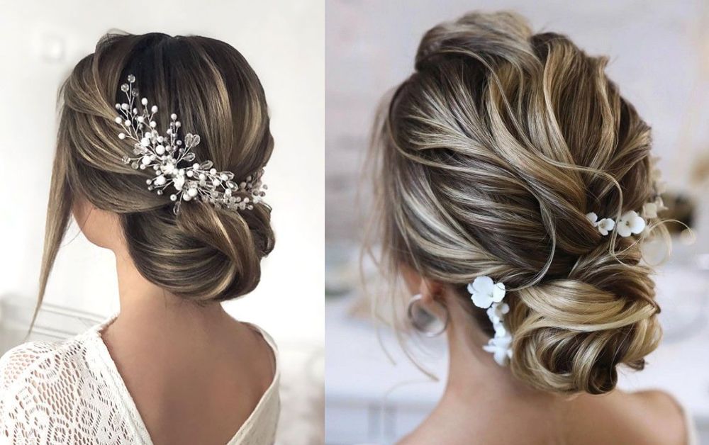 Elegant updo on medium hair with decorative accessories like pearl and floral pins