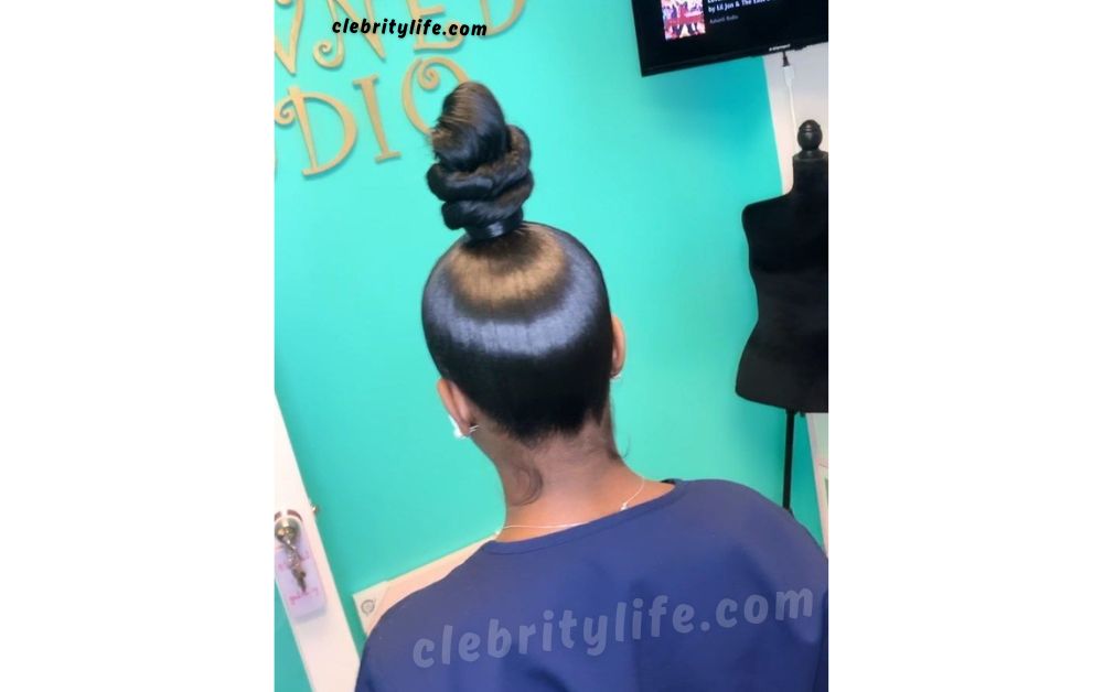 10 Elegant Natural Hair Updo Styles for Black Women 8 Beautiful High Top Knot Updo for Natural Hair look